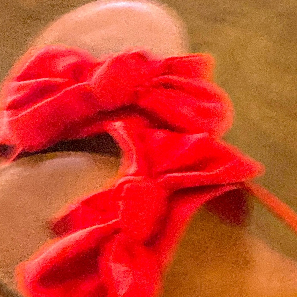 Bowed red suede strappy low heeled flip flop sandal